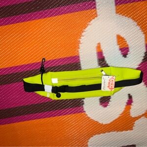 FP Movement slim fold runner sling bag honeydew yellow neon hip bag